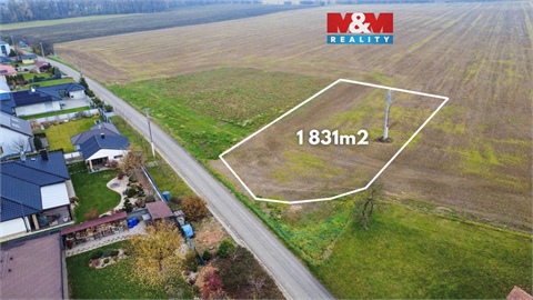 Prodej stavebního pozemku, 1 831 m² 0