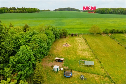 Prodej stavebního pozemku, 1 016 m² 0